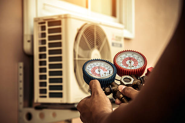 Professional Hvac technician working in Potomac, MD